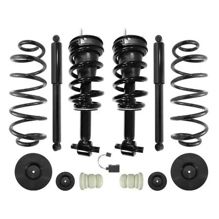 Cardboard box containing four pre-assembled strut units with coil springs and top mounts