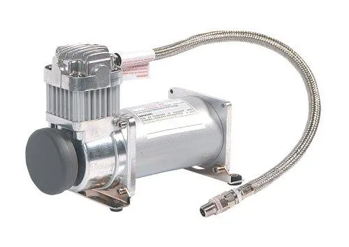 Silver cylindrical 12V air compressor with mounting feet and vibration isolators