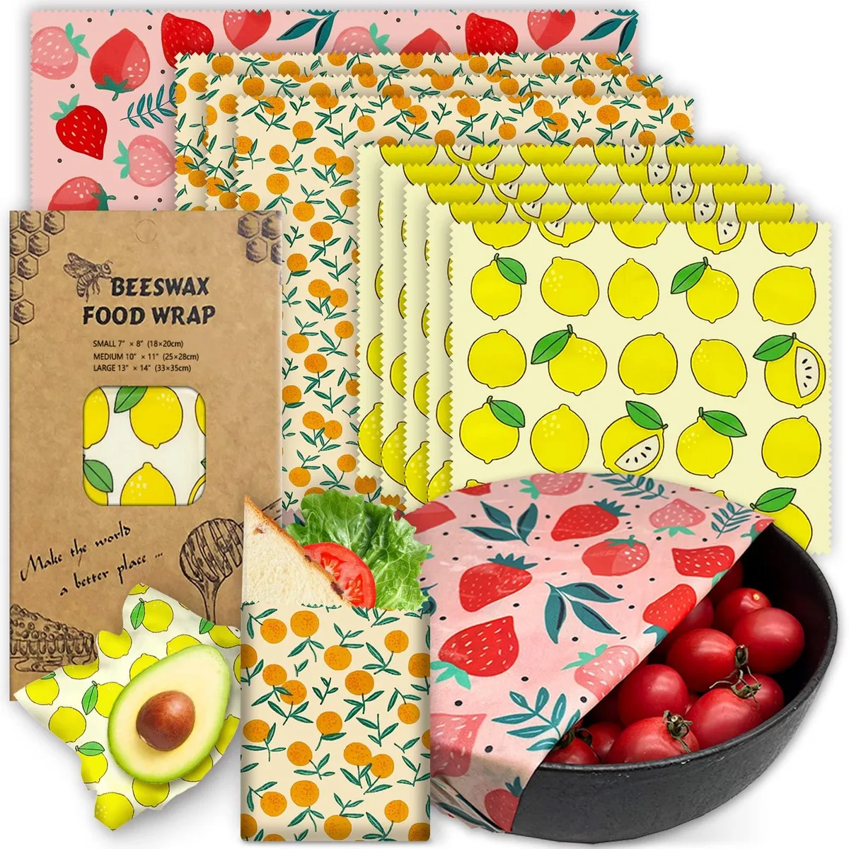 Nine beeswax food wraps in strawberry, orange and lemon prints, stacked flat