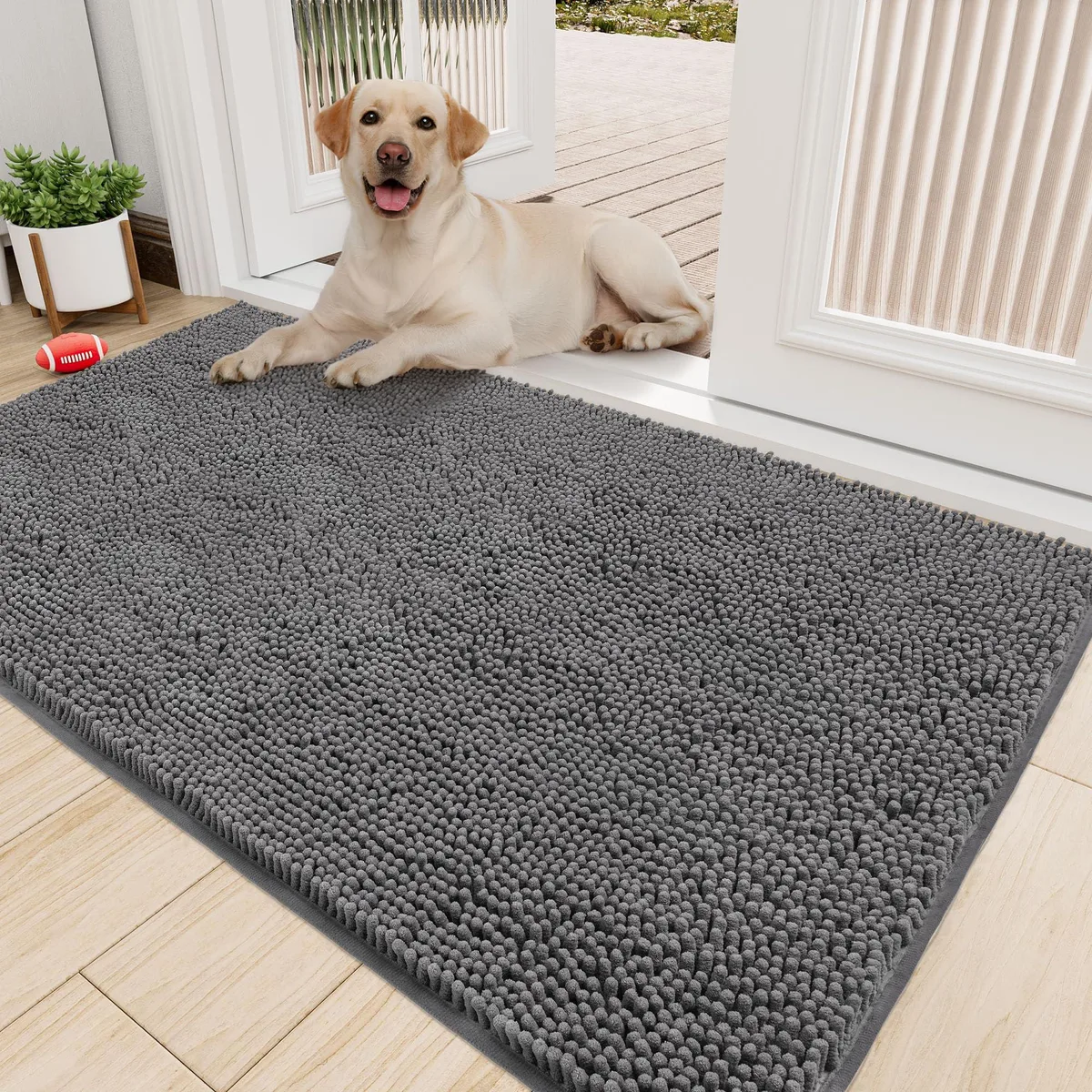 Grey rectangular chenille door mat 60 by 30 inches with rubber backing