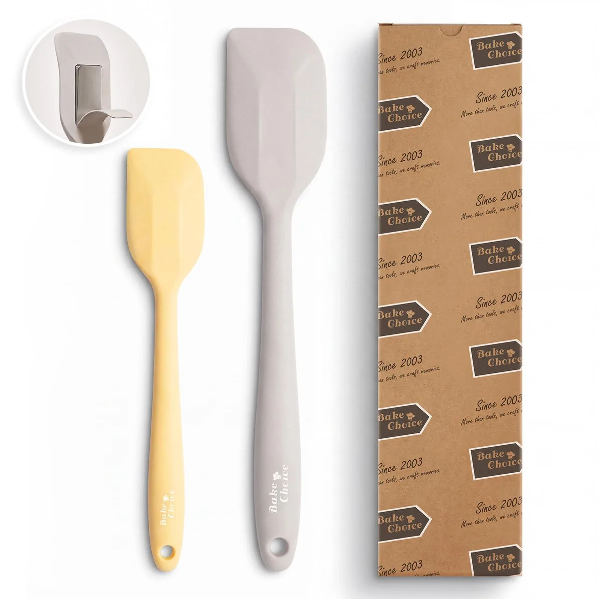 Two silicone spatulas with steel cores, one large one small