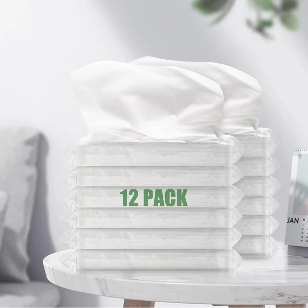 Twelve small rectangular tissue packets in clear plastic wrapping