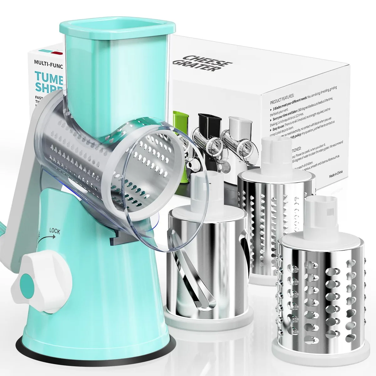Rotary cheese grater with hand crank, transparent barrel, suction base, three interchangeable stainless steel blades