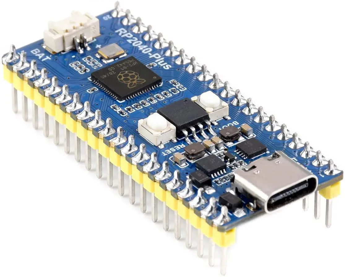 Green rectangular circuit board with USB-C port, pin headers along edges, and surface-mounted chips