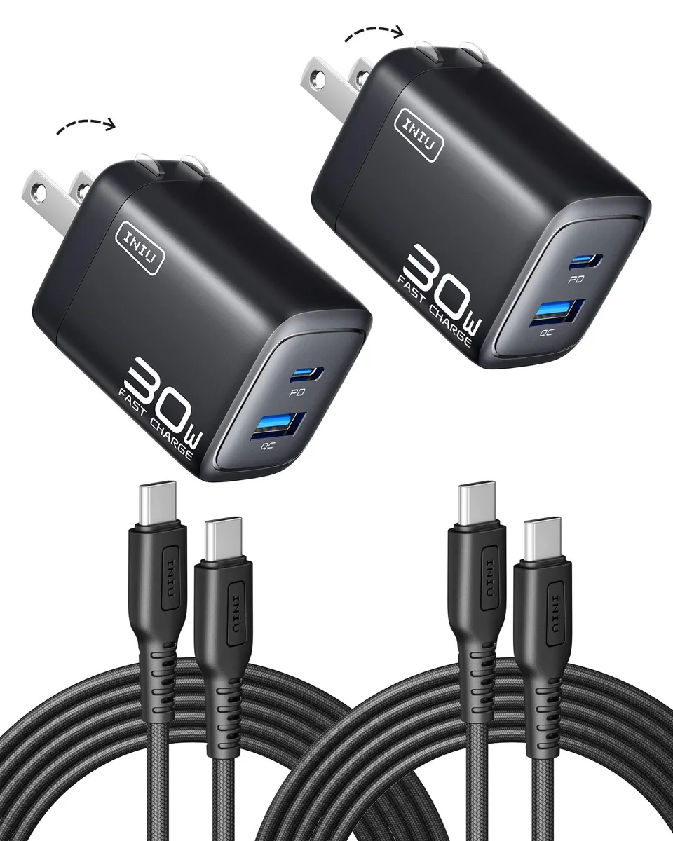 Two compact black USB-C wall chargers with USB-A ports and matching braided cables