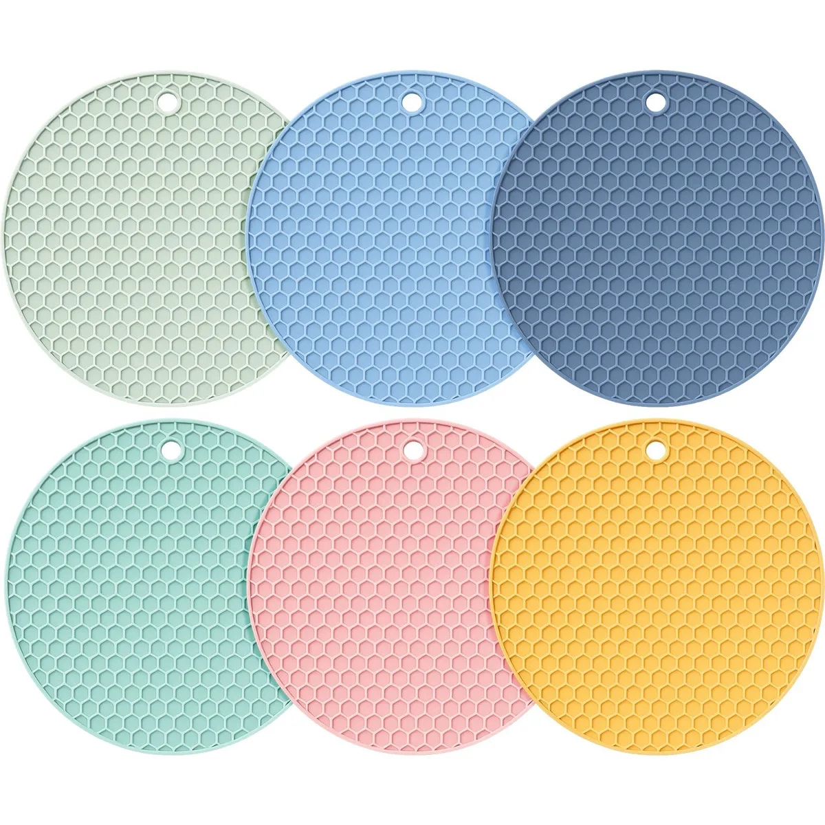 Six round 18 cm silicone trivets in muted Morandi colours, honeycomb texture