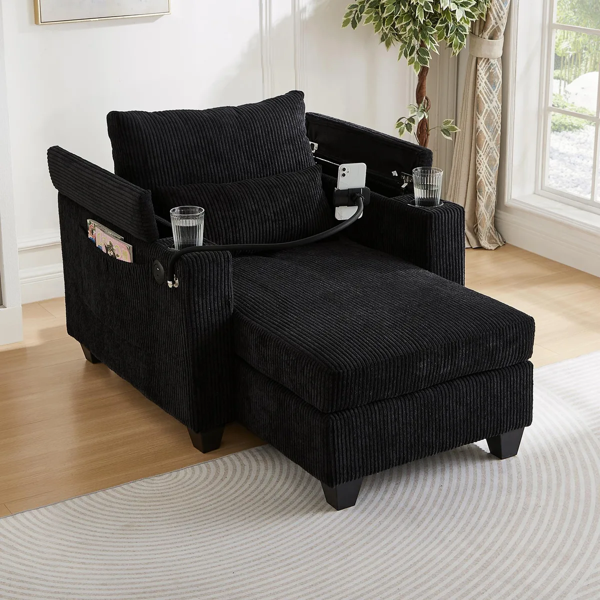 Black corduroy convertible chaise lounge with USB ports and cup holders