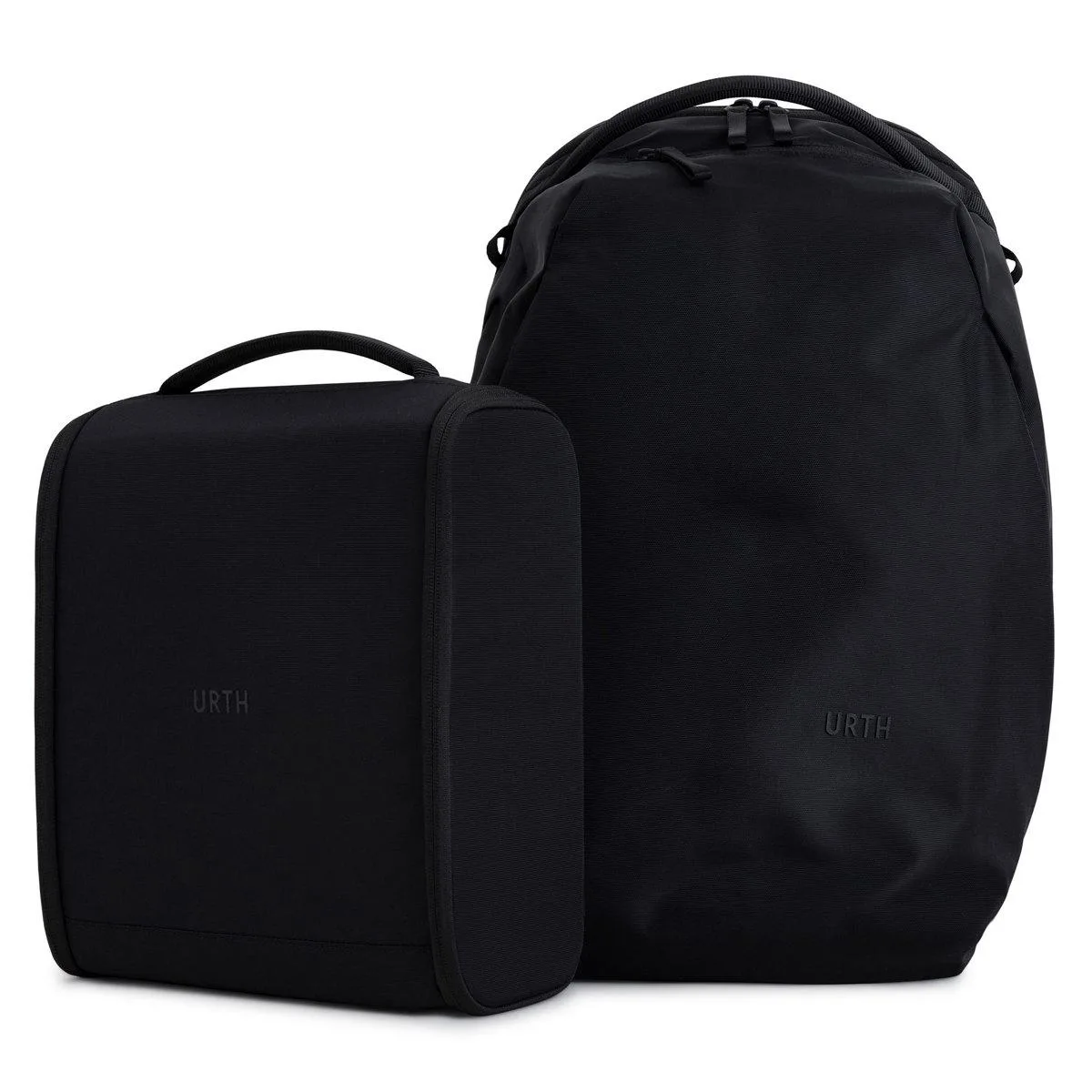 Black 24L modular camera backpack with medium insert, weatherproof recycled nylon, 14 storage zones, side access
