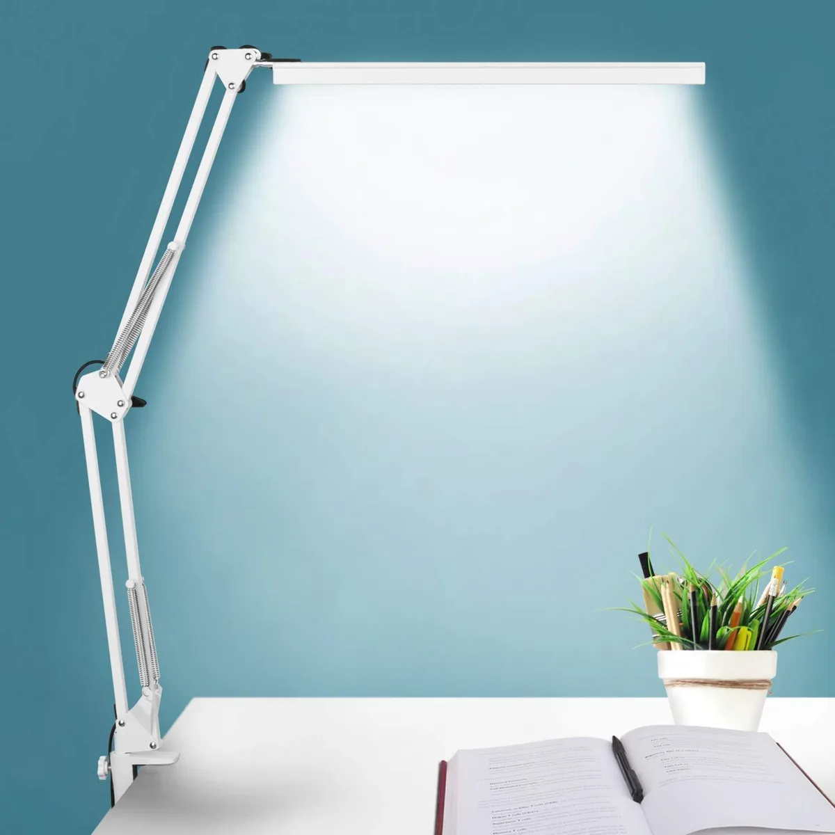 White 16-inch tubular LED desk lamp with adjustable metal arm and clamp base