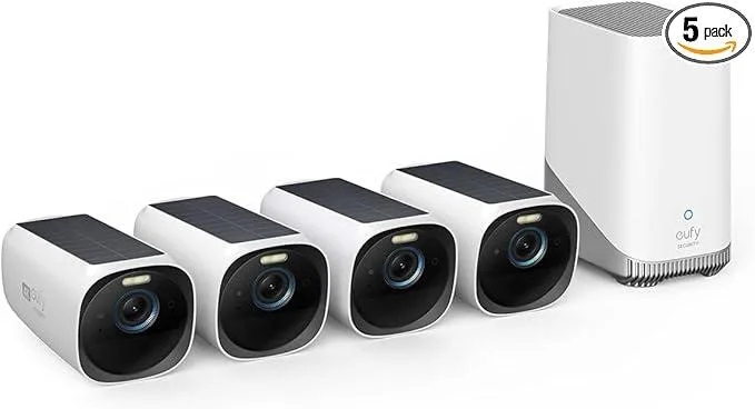 Four white wireless cameras with integrated solar panels on top, rectangular shape, smooth matte finish