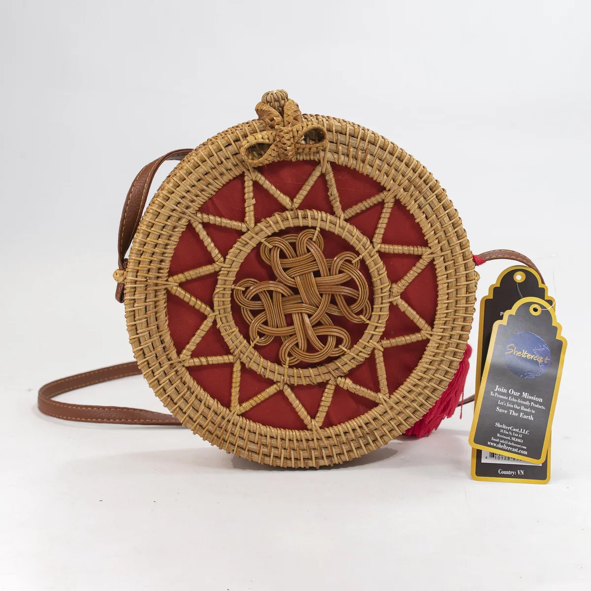 ShelterCast ShelterCast Handwoven Round Rattan Shoulder Bag Large Natural Red Tassel — product photo