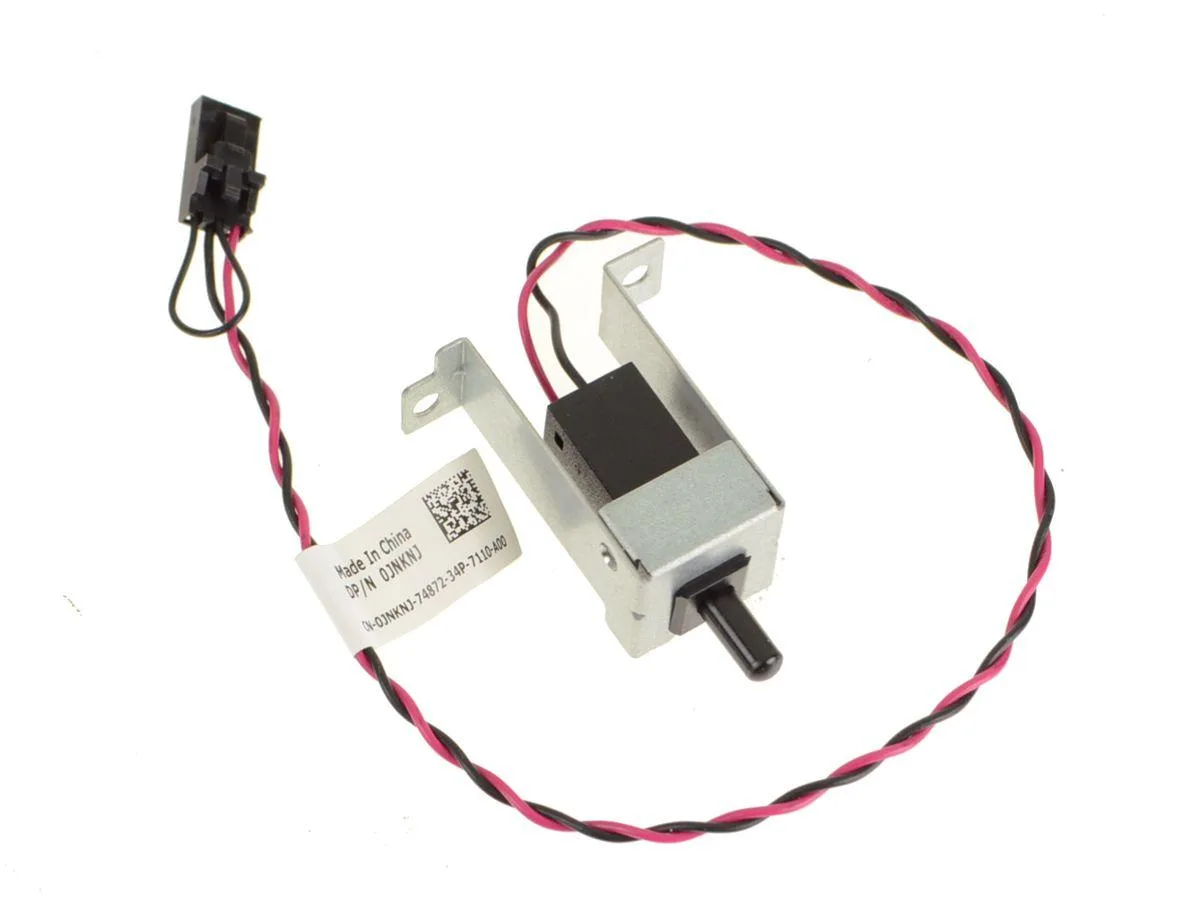 Small rectangular circuit board with thin ribbon cable attached