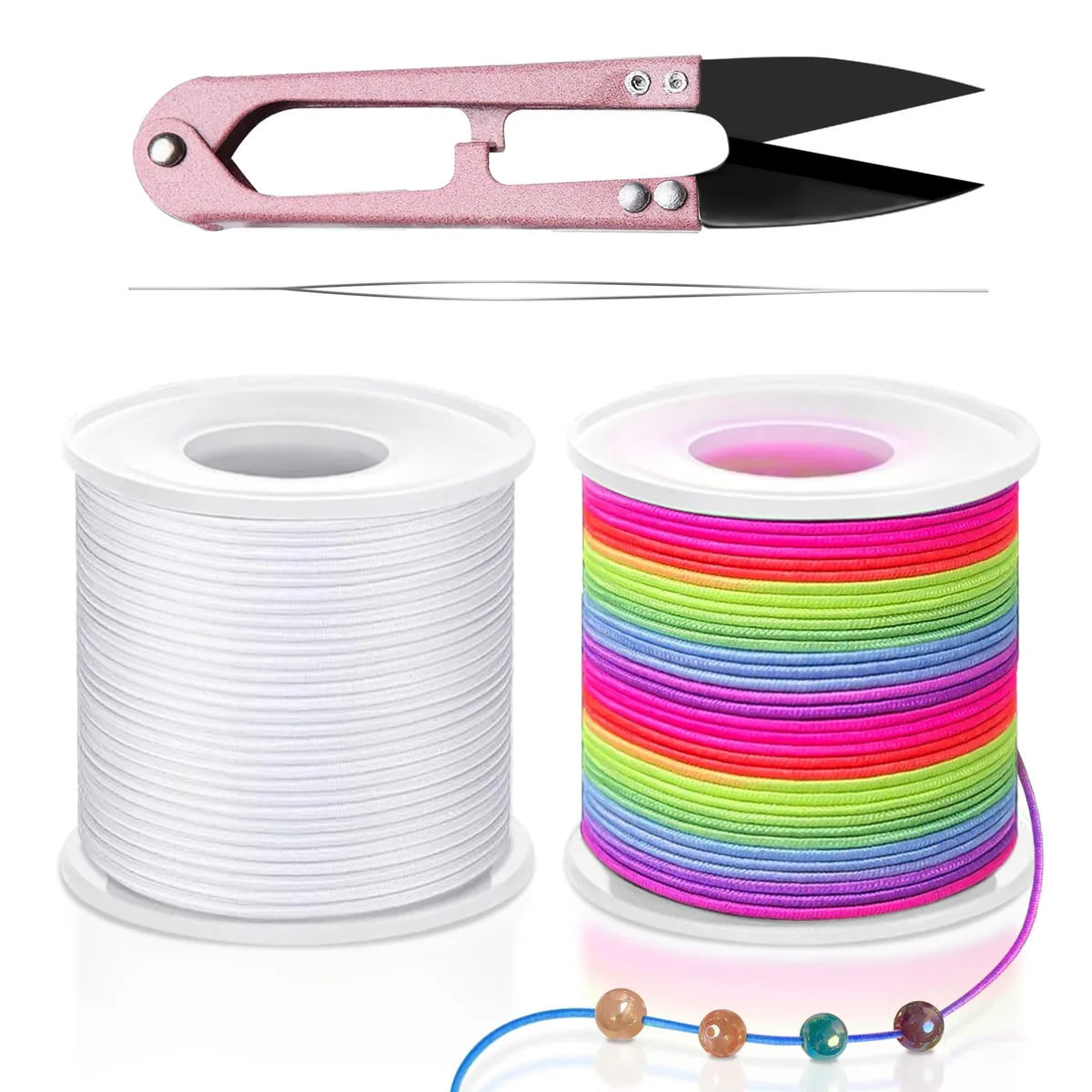 Two spools of 1 mm stretchy cord, one white and one rainbow, with scissors and needle