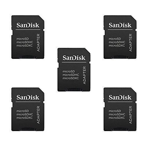 Five small black plastic MicroSD-to-SD adapters in a row