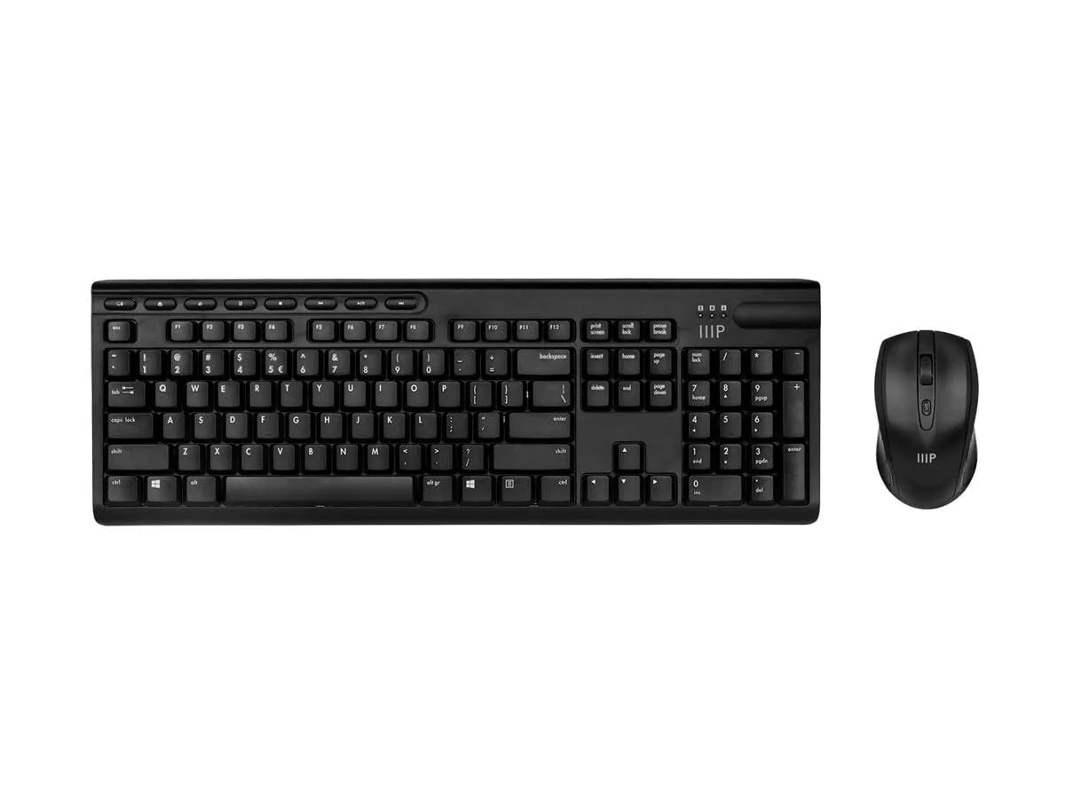 Black full-size wireless keyboard with number pad and matching optical mouse on a desk