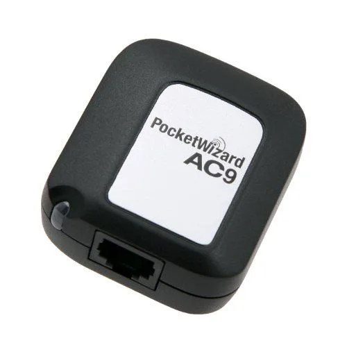 Black rectangular adapter with PocketWizard branding and connector port