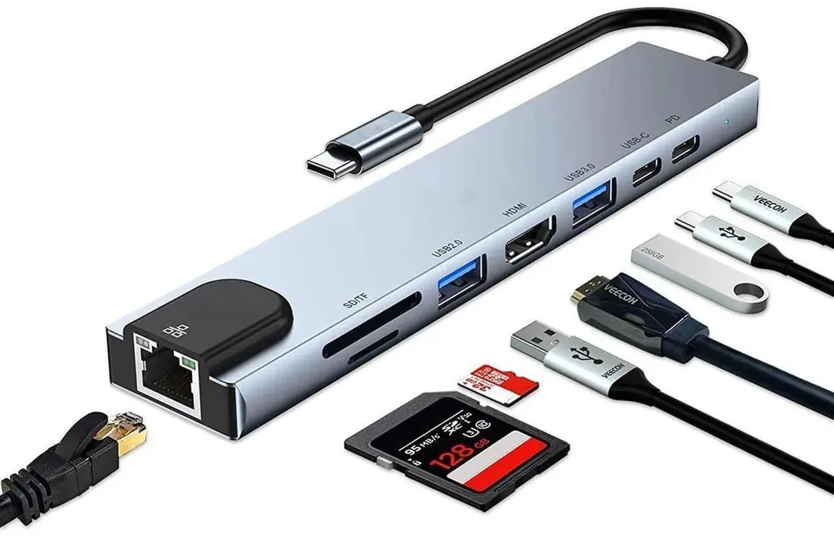 Compact silver USB-C hub with HDMI, Ethernet, card slots and multiple USB ports