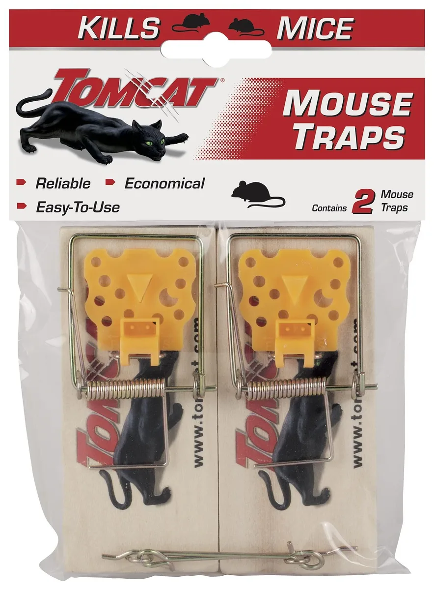 Two wooden mouse traps with U-shaped snap bars