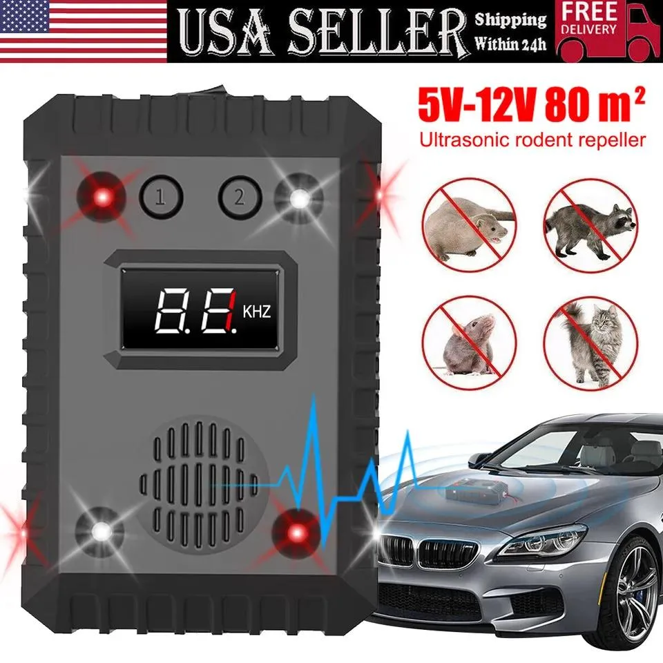 Small white plastic pest repeller with four LED lights and two mode buttons