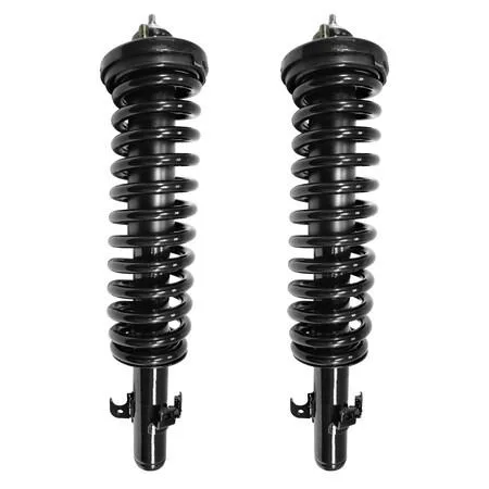 Pair of fully assembled front strut units with coil springs and top mounts, silver finish