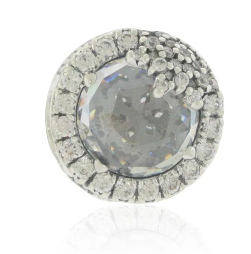 Silver button charm with faceted stone and frosted snowflake frame