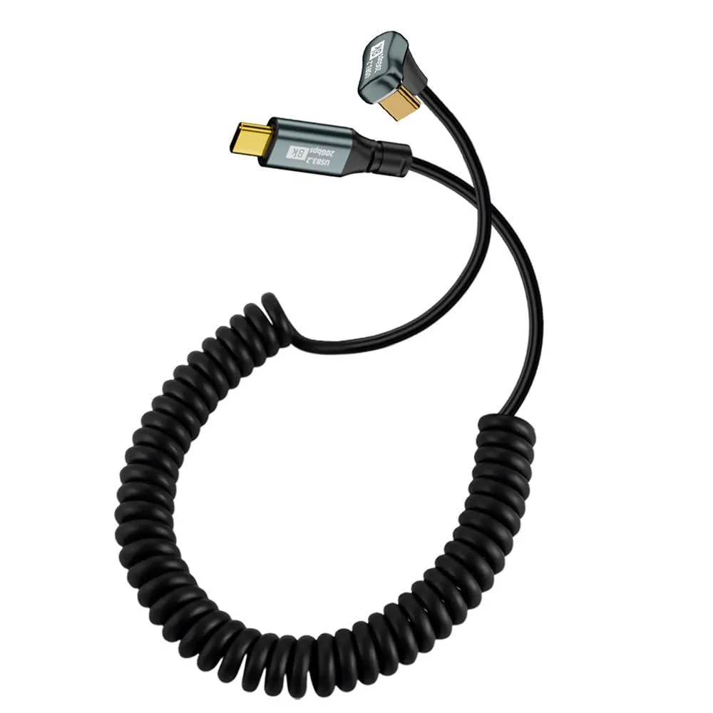 Black coiled USB-C cable with opposite back-angled male connectors, stretches to 1.8 metres