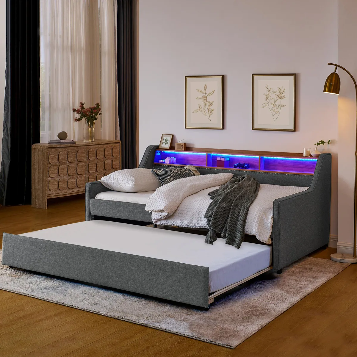 Grey linen twin sofa bed with LED headboard, storage shelf, wireless charging pad and pull-out trundle