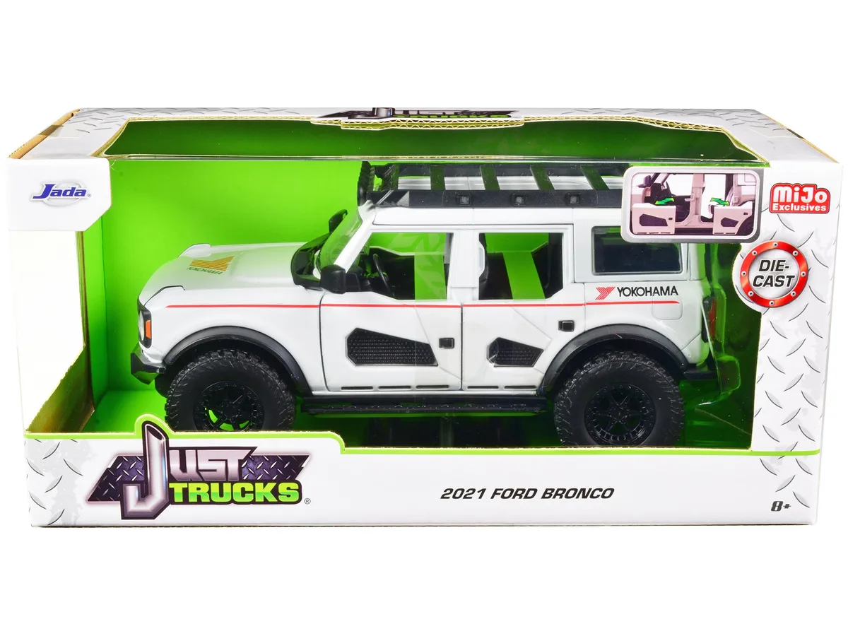 Jada Jada 2021 Ford Bronco White Red Stripes Roof Rack Yokohama Tires Just Trucks 1/24 Diecast Hobby Collectible — product photo