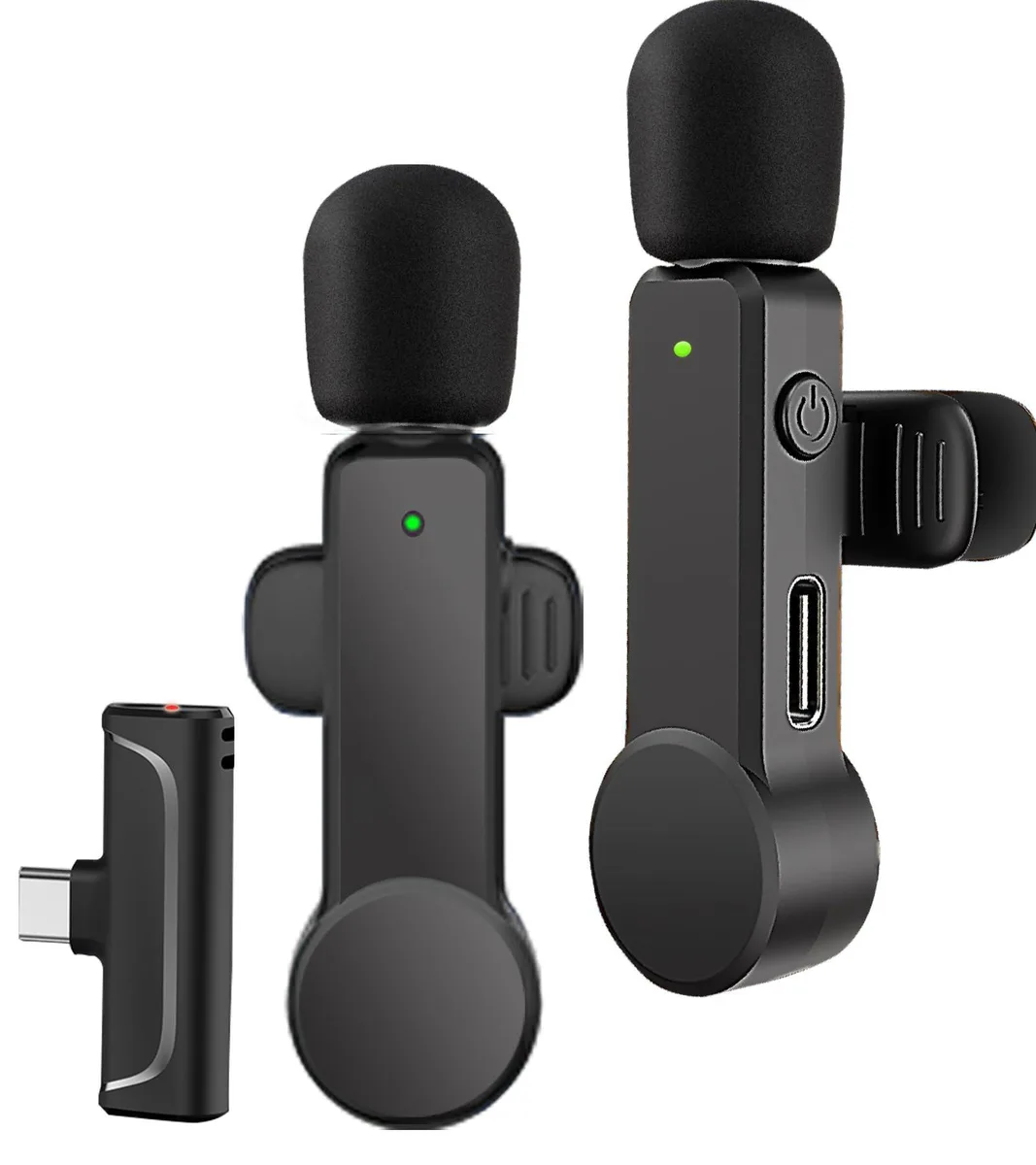 Two black clip-on wireless microphones with USB-C receivers, foam windscreens, mute buttons and charging cases