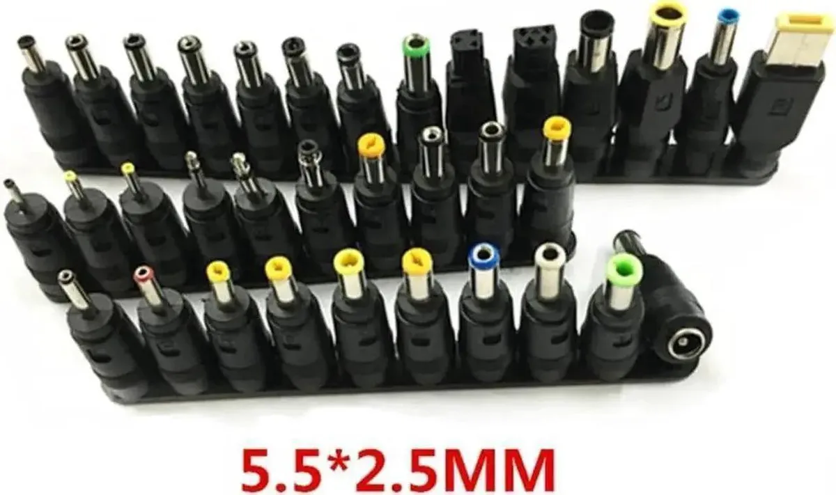 A set of 5.5 x 2.1 mm DC connector tips in a plastic storage box