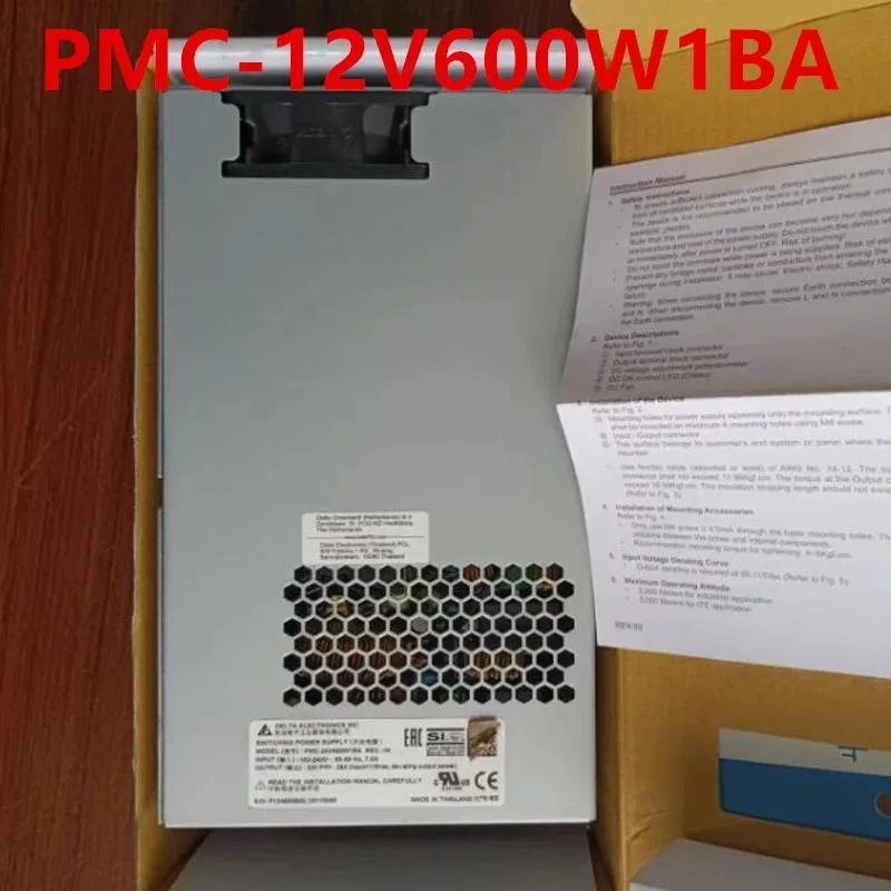 Silver ATX power supply unit with cooling fan and cable bundle