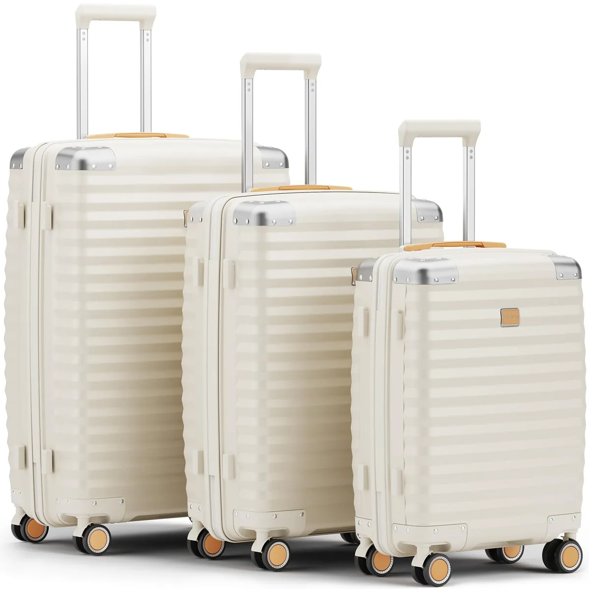 Three white hard-shell suitcases in 20, 24, 28 inch sizes standing side by side