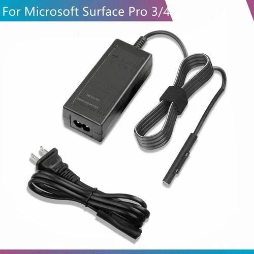 White rectangular AC adapter with black detachable cables and a magnetic connector tip