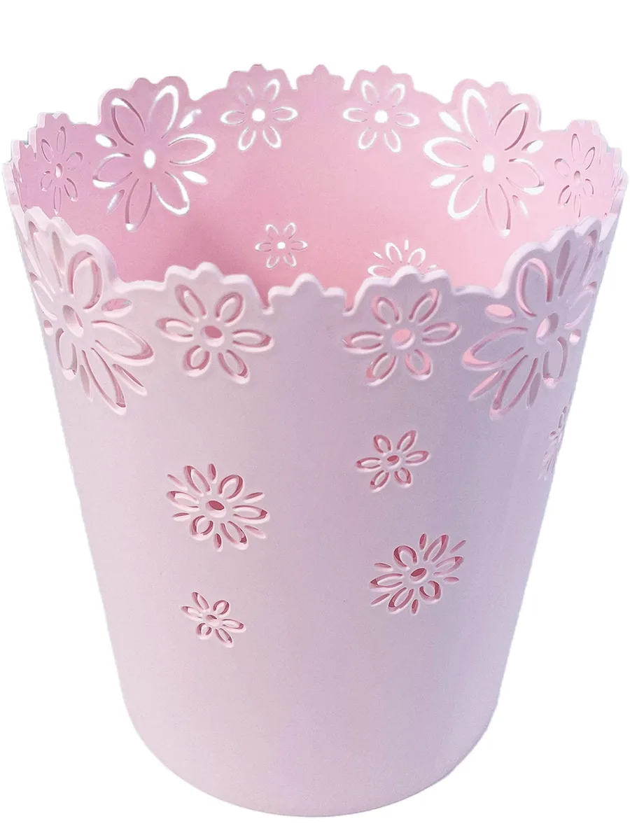 Pink plastic mini trash cans with hollow flower pattern, pack of twelve