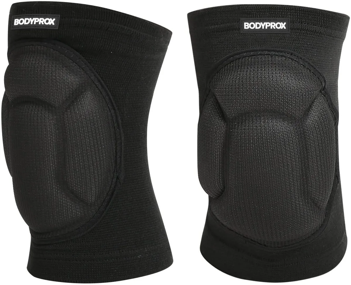 Pair of black large knee sleeves with thick foam padding and elastic fabric