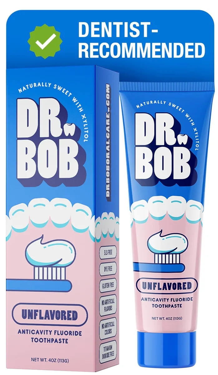 White 4 oz tube of unflavored fluoride gel toothpaste with xylitol