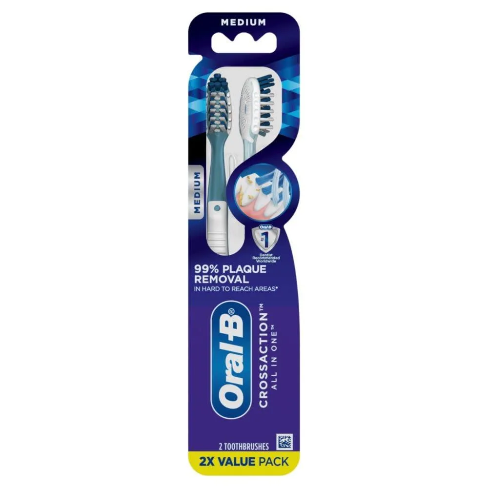 Two medium-bristle manual toothbrushes with angled CrossAction bristles, built-in tongue scraper, multicolor handles