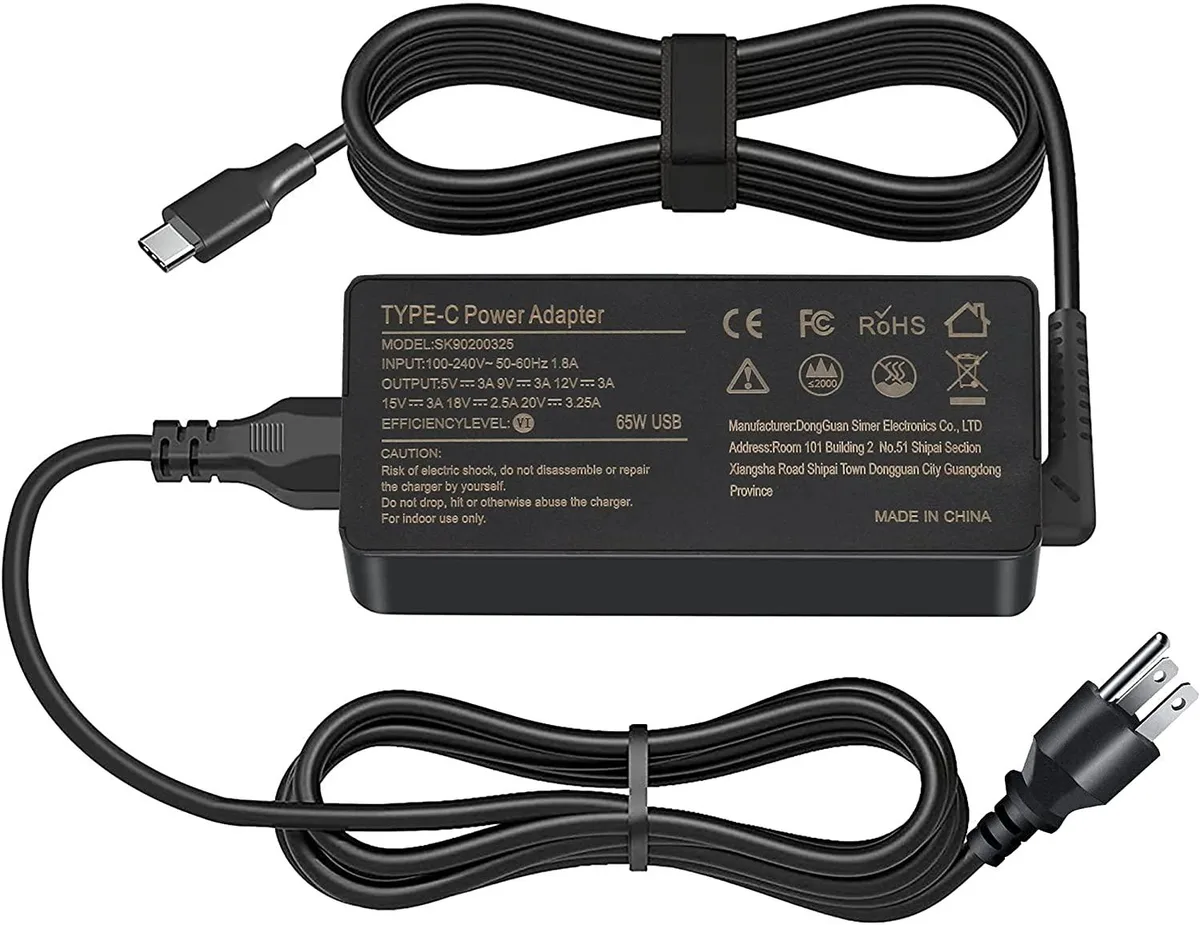 Compact black USB-C power adapter with folding AC prongs