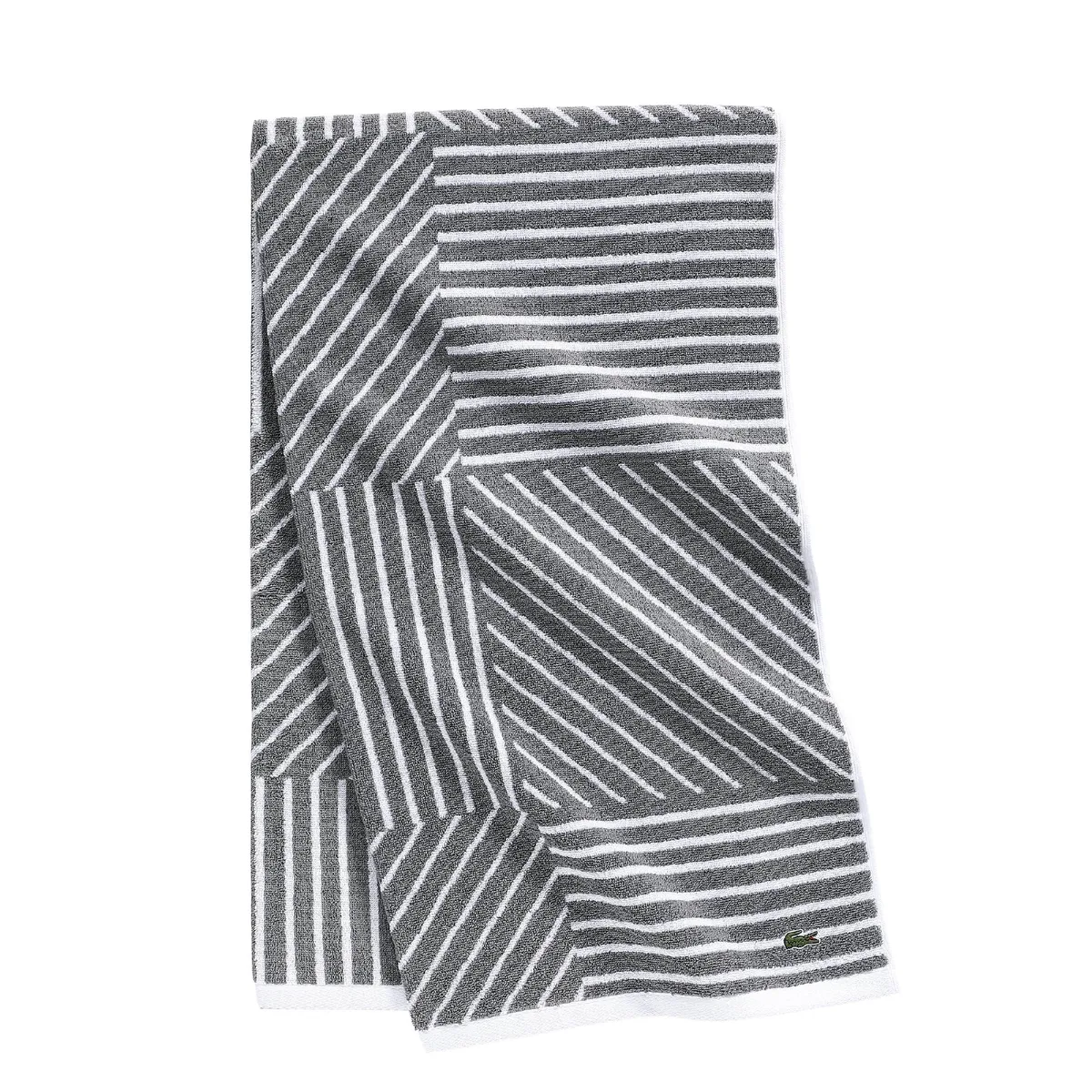 White cotton bath towel with geometric reversible pattern, 30 by 54 inches