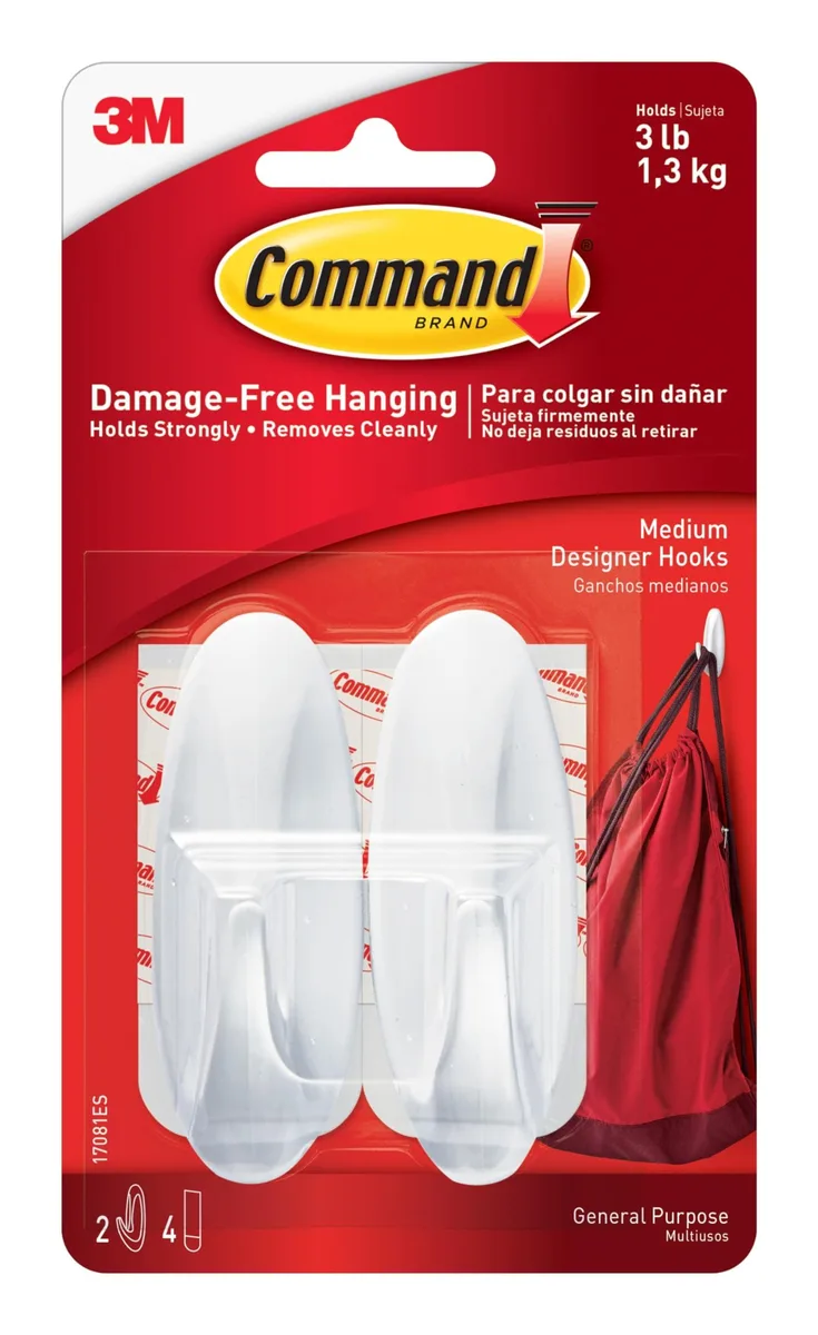 Two white medium designer hooks with four adhesive strips