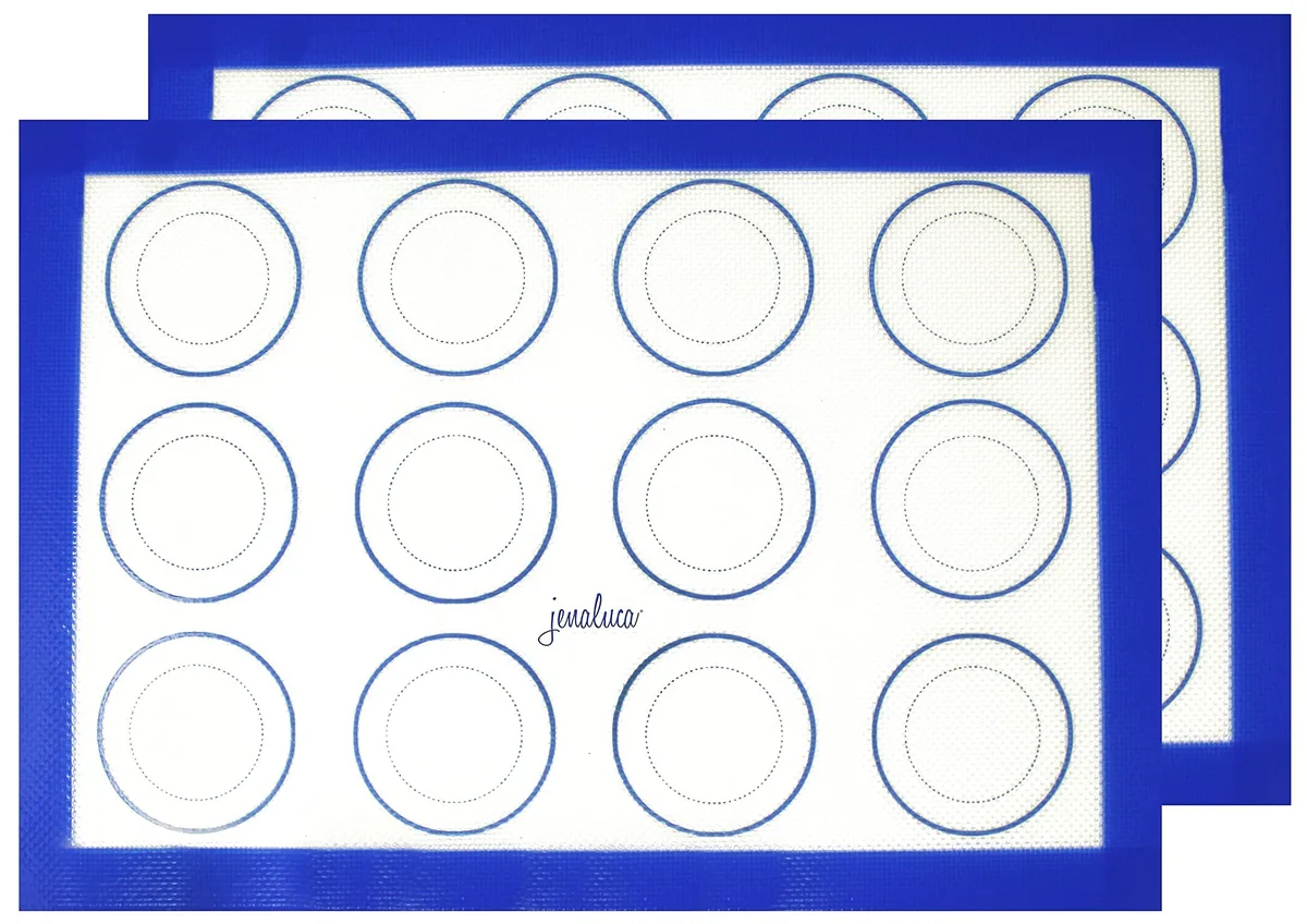 Two rectangular light-grey silicone baking mats with printed cookie guides, 16.5 x 11.6 inches