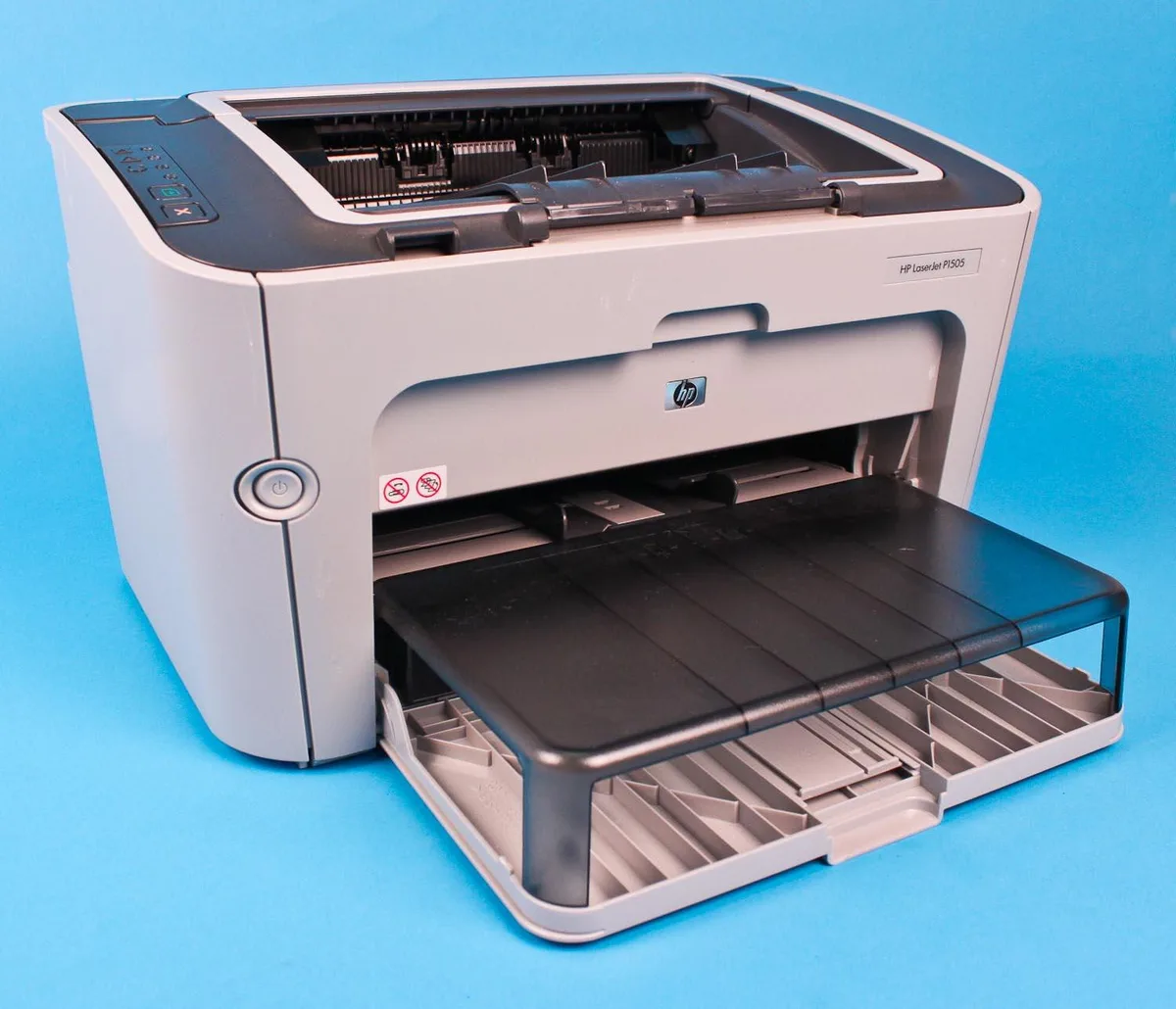 Compact grey laser printer with front paper tray and top output bin