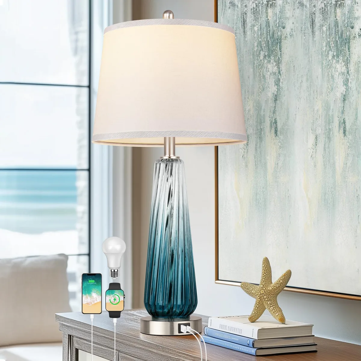 Teal glass table lamp with white fabric drum shade and metallic base, 27.5 inches tall