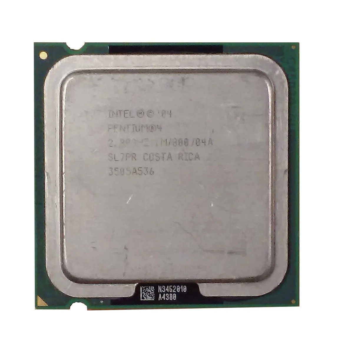 Square green processor with gold contacts and silver heat spreader