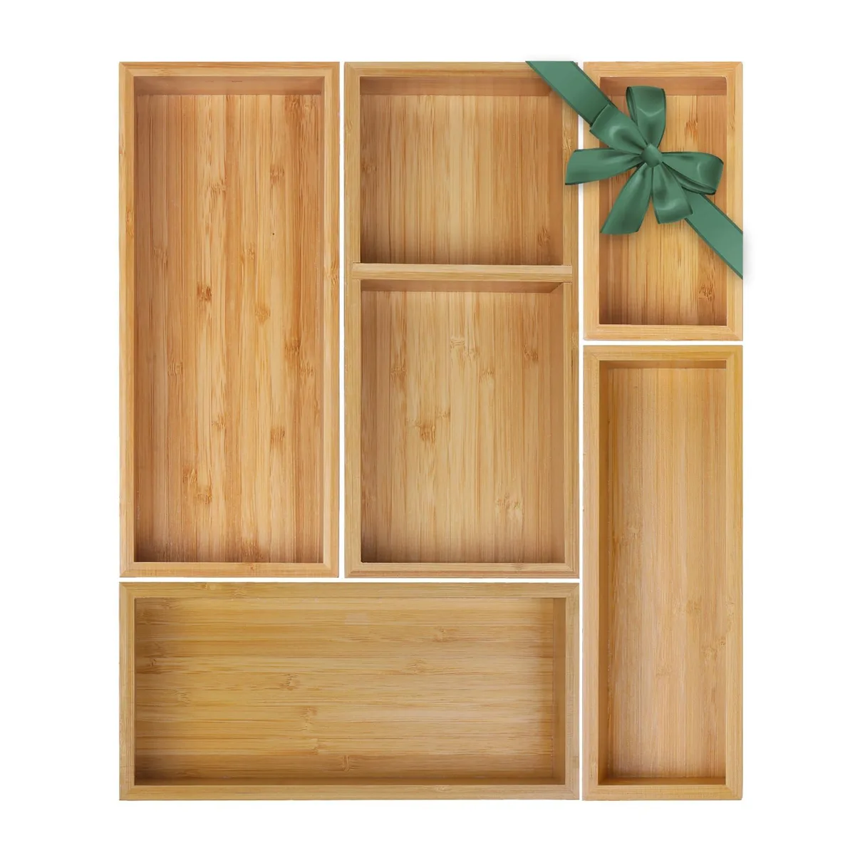 Five rectangular bamboo trays in assorted sizes, light natural finish, stacked together