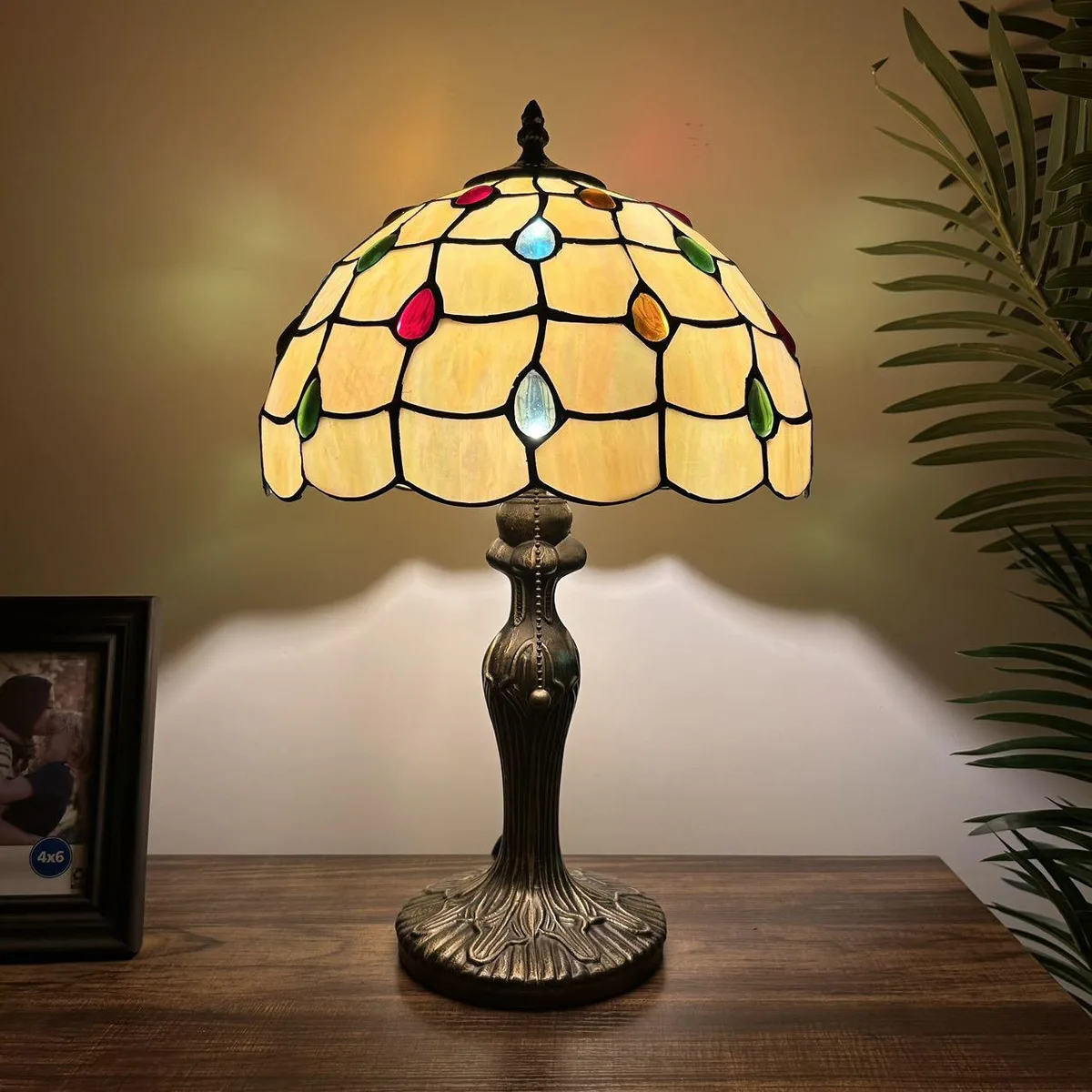 Tiffany table lamp with stained glass shade and bronze zinc alloy base, 12 inches wide, 19 inches high