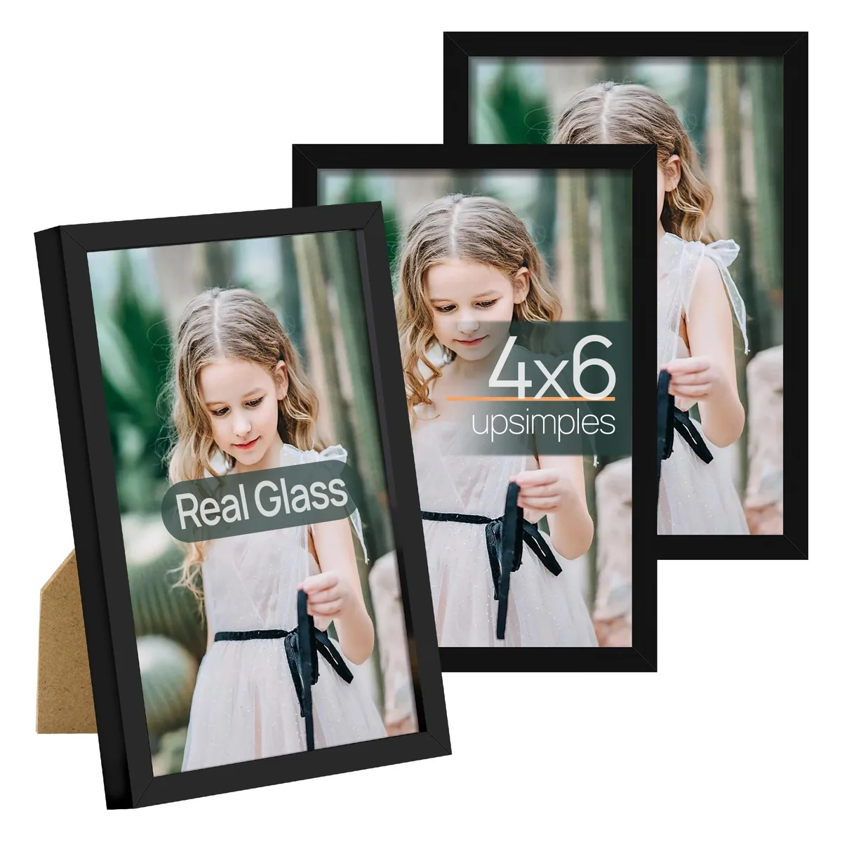 Three black plastic 4x6 frames with glass fronts, rectangular, thin borders, polished finish, wall or tabletop display