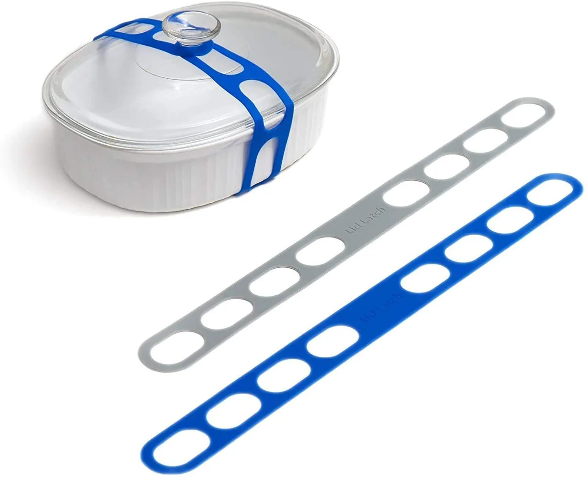 Blue-grey silicone strap with latch hooks, coiled in polybag