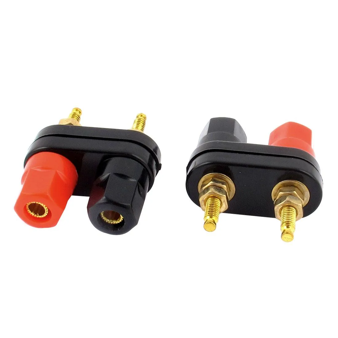 Two black and red binding posts with gold terminals side by side