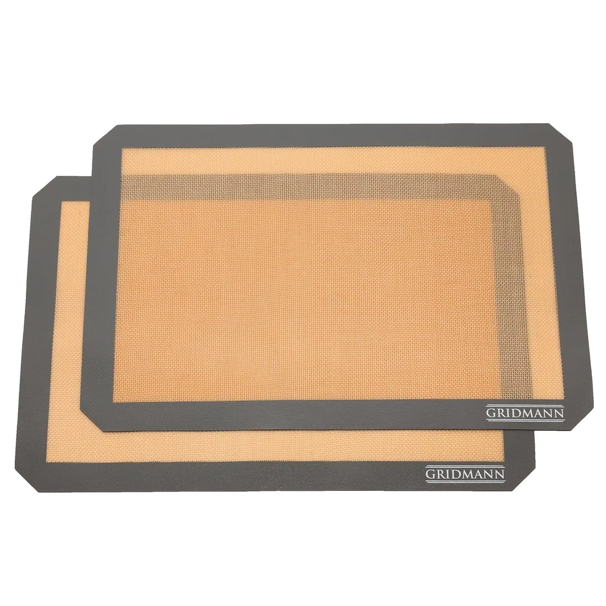 Two tan silicone baking mats on half-sheet pan